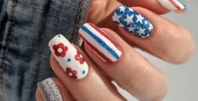 Classy Fourth of July Nails featuring red, blue, and white colors with stars and floral designs