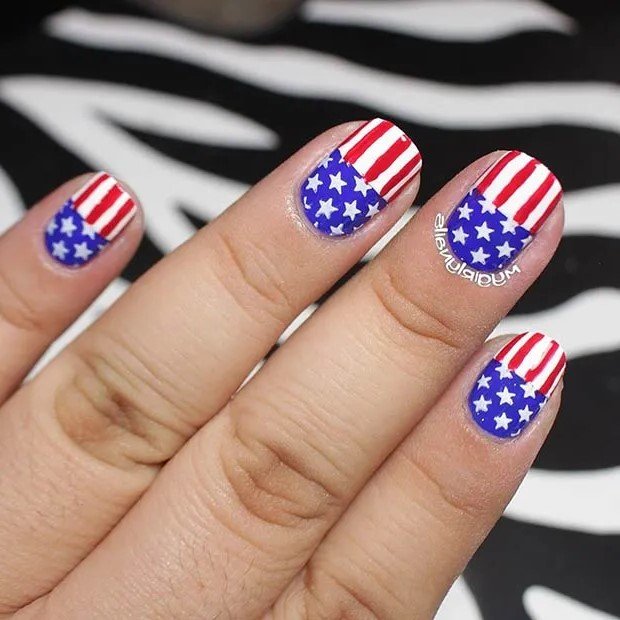 American flag nail designs with stars on blue and red and white stripes, perfect for a bold patriotic look