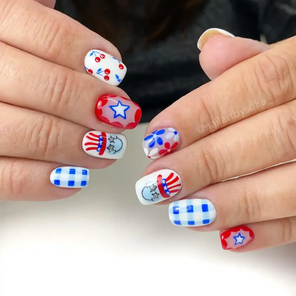 Cute 4th of July nails featuring Uncle Sam, stars, and cherry designs for a festive and patriotic manicure