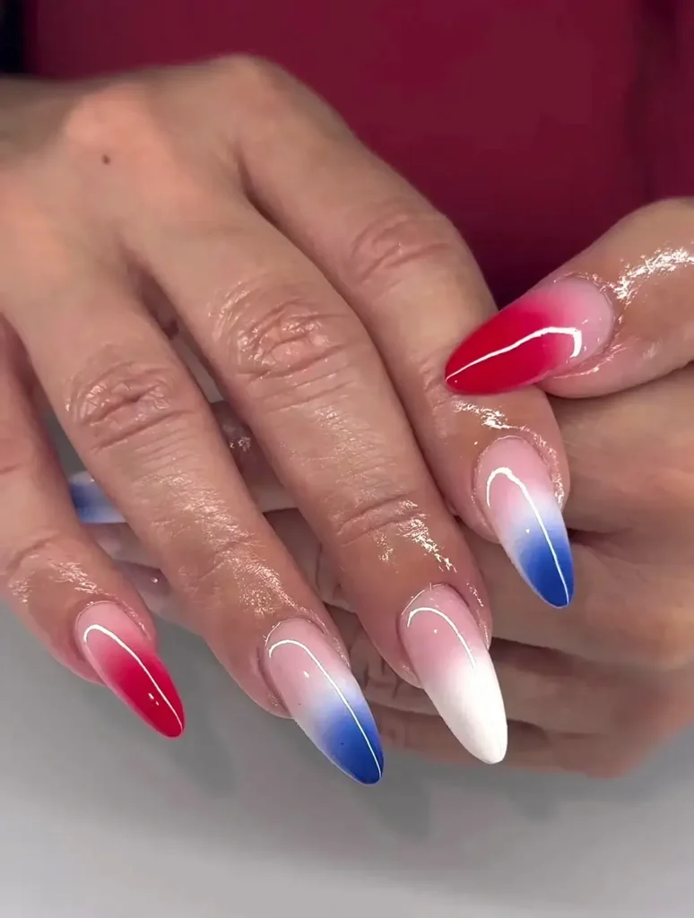 Patriotic gel nail designs with red, white, and blue colors, featuring ombre patterns and geometric shapes for a stylish and durable look